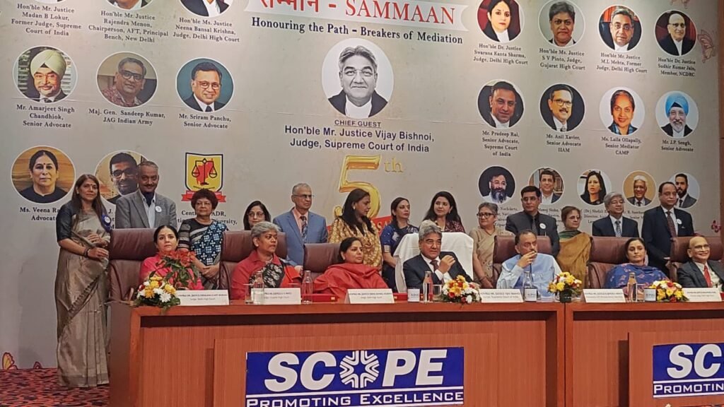 Supreme Court Judge Justice Vijay Bishnoi addressing the 5th Foundation Day and Felicitation Ceremony of AIIMAS at SCOPE Convention Centre, New Delhi.